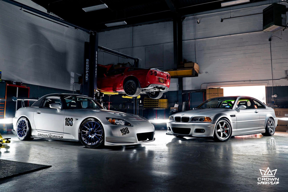 Vehicles inside the CrownSpeedLab workshop