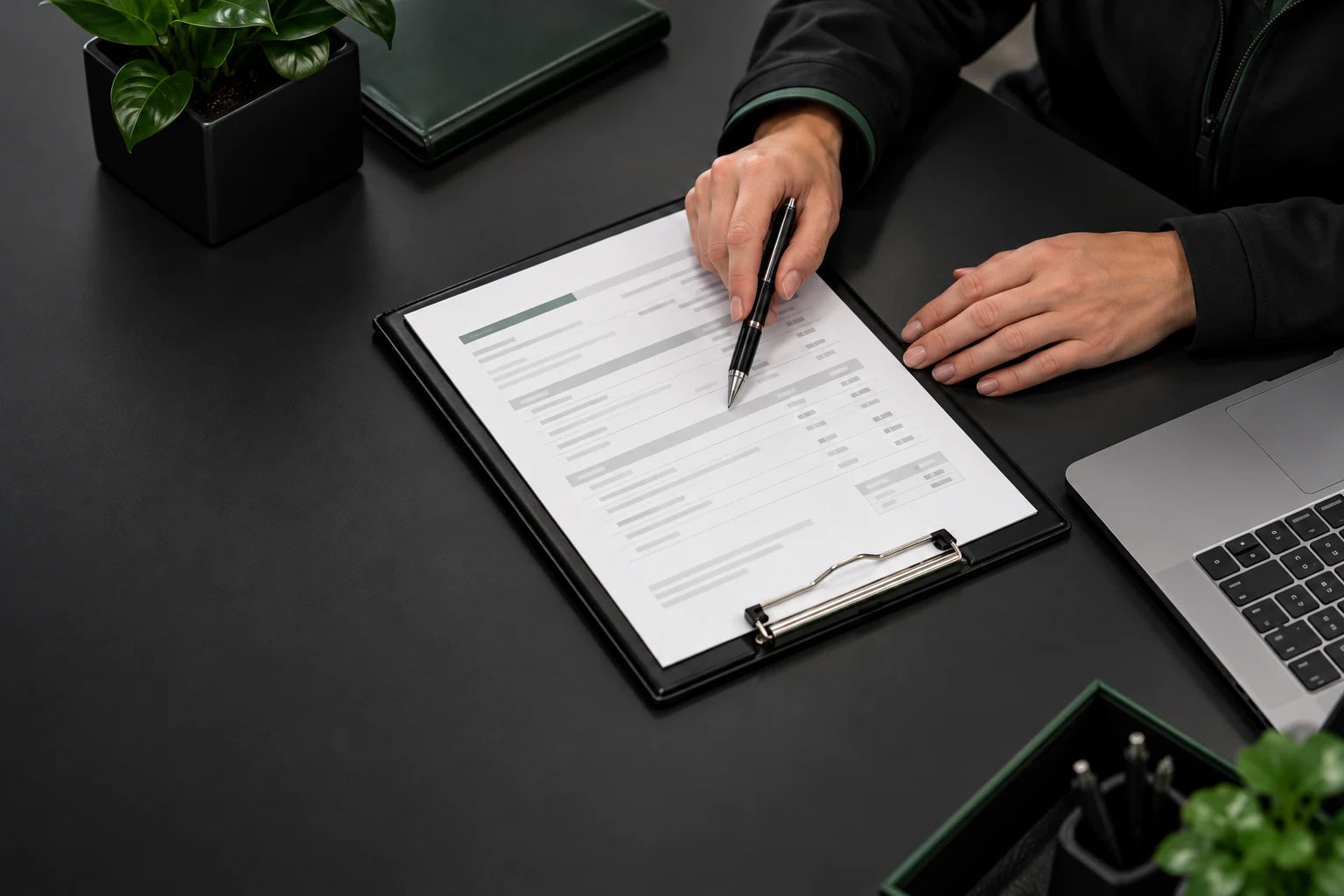 Hands reviewing repair paperwork and an estimate